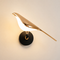 Luma Bird – Applique LED decorativa oro e nero